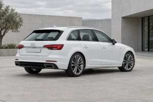 White Audi A3, rear three-quarter view